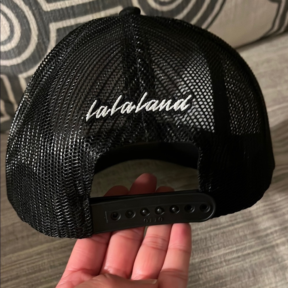 Black Trucker Hat With Bold Statement - image 2
